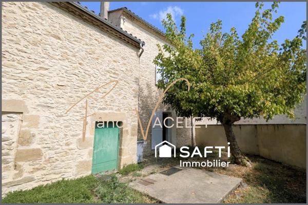 Maison avec jardin clos, dépendances et fort potentiel