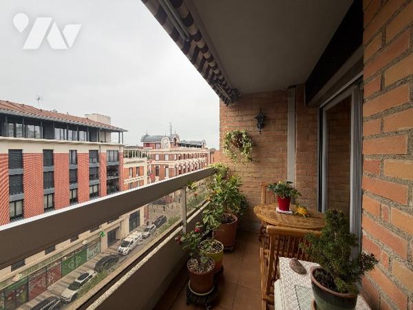 T3 centre-ville avec balcons, parking en sous-sol et cave