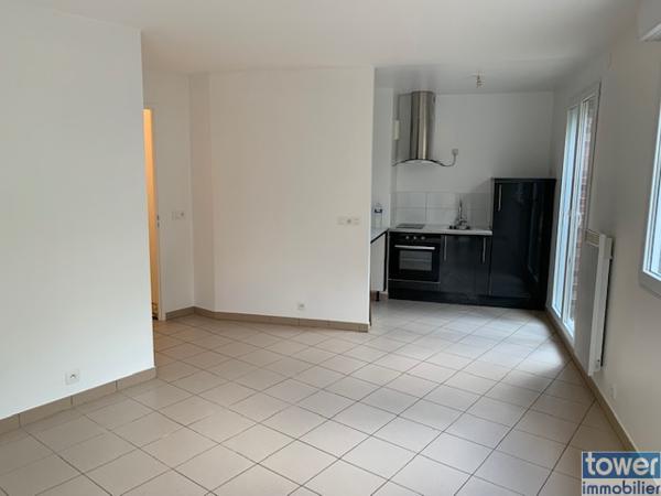 Rez-de-jardin avec jardin privatif + parking – Opportunité rare !