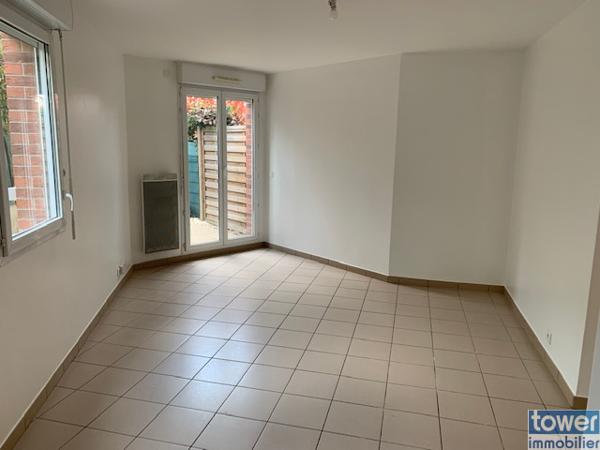 Rez-de-jardin avec jardin privatif + parking – Opportunité rare !