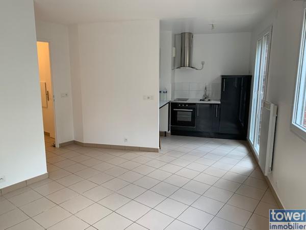 Rez-de-jardin avec jardin privatif + parking – Opportunité rare !