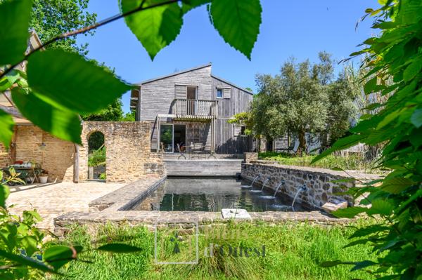 Maison ossature bois avec bassin naturel SAINT GOUSTAN AURAY