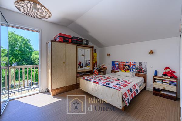 Maison ossature bois avec bassin naturel SAINT GOUSTAN AURAY