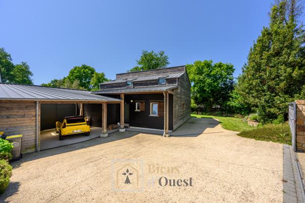 Maison ossature bois avec bassin naturel SAINT GOUSTAN AURAY