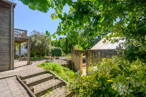 Maison ossature bois avec bassin naturel SAINT GOUSTAN AURAY