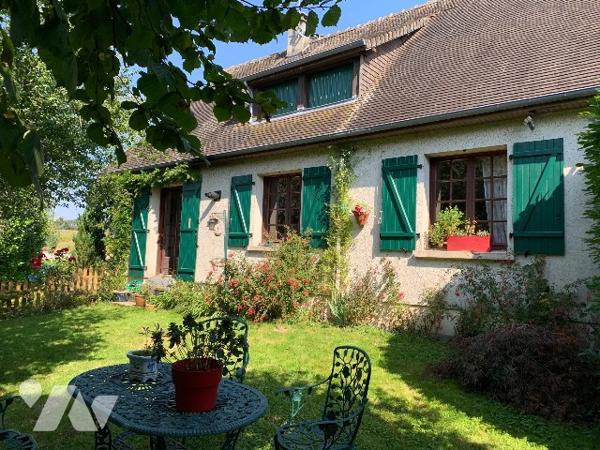 Une maison de trois chambres à coucher d'environ 120 m² sur terrain d'environ 3.960 m².