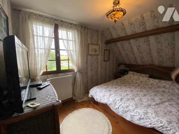 Une maison de trois chambres à coucher d'environ 120 m² sur terrain d'environ 3.960 m².