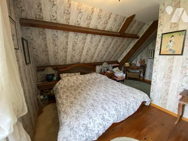 Une maison de trois chambres à coucher d'environ 120 m² sur terrain d'environ 3.960 m².