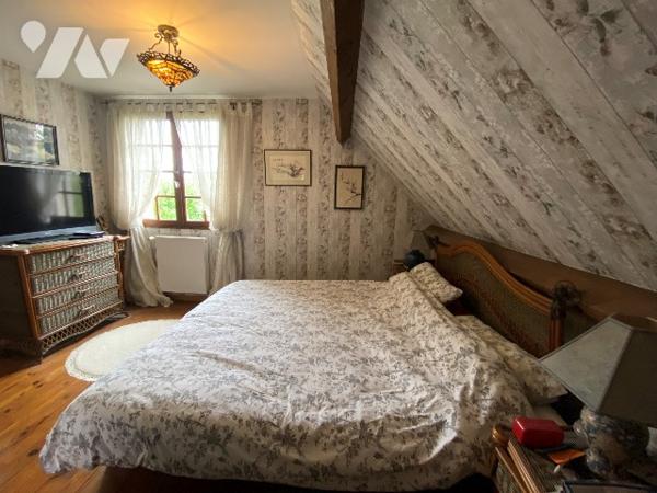 Une maison de trois chambres à coucher d'environ 120 m² sur terrain d'environ 3.960 m².