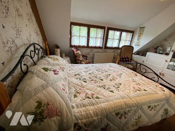 Une maison de trois chambres à coucher d'environ 120 m² sur terrain d'environ 3.960 m².