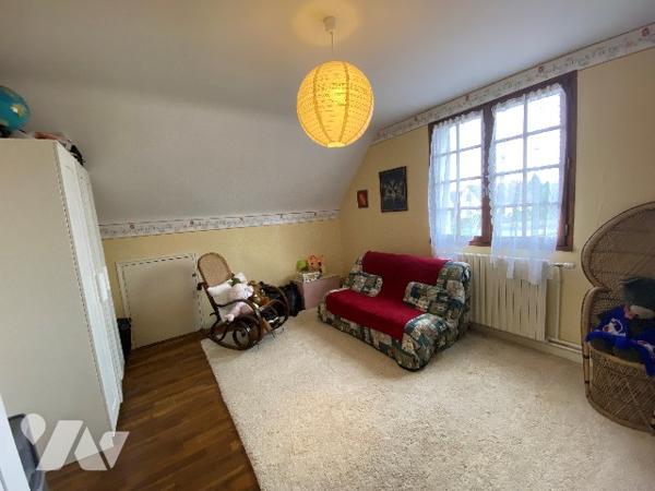 Une maison de trois chambres à coucher d'environ 120 m² sur terrain d'environ 3.960 m².