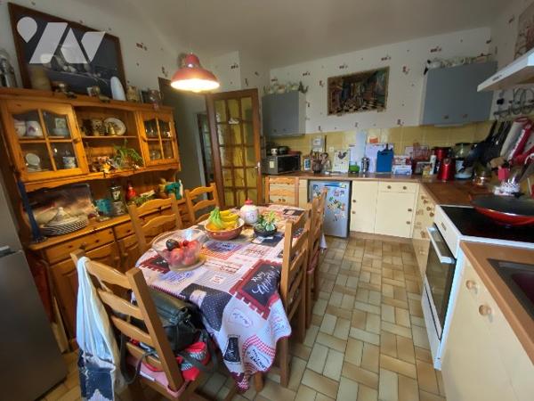 Une maison de trois chambres à coucher d'environ 120 m² sur terrain d'environ 3.960 m².