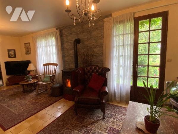 Une maison de trois chambres à coucher d'environ 120 m² sur terrain d'environ 3.960 m².