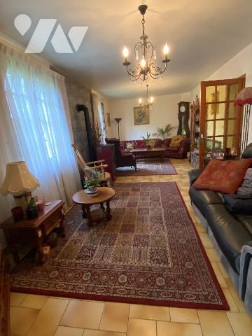 Une maison de trois chambres à coucher d'environ 120 m² sur terrain d'environ 3.960 m².