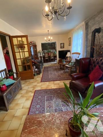 Une maison de trois chambres à coucher d'environ 120 m² sur terrain d'environ 3.960 m².