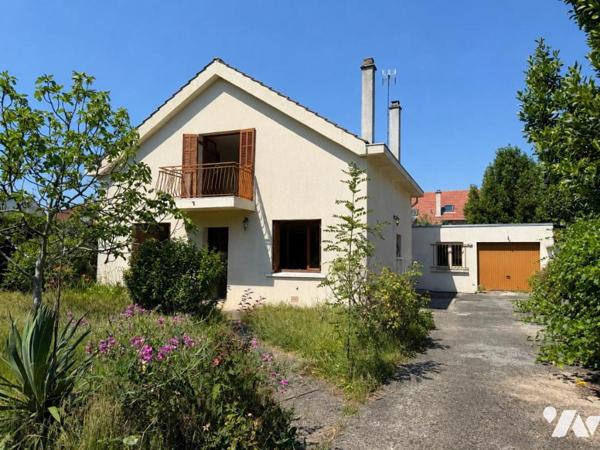Maison de 3/4 pièces avec garage dans quartier résidentiel