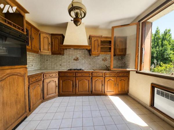 Maison de 3/4 pièces avec garage dans quartier résidentiel