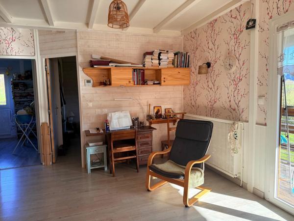 Chalet de 85m2, 2 chambres sur terrain de 2044 m2.