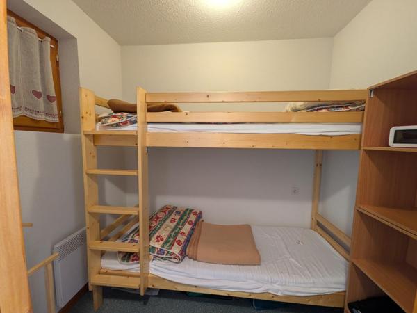 Appartement 3 pièces plus cabine avec balcon exposé sud au pied des Pistes avec 2 parkings privatifs