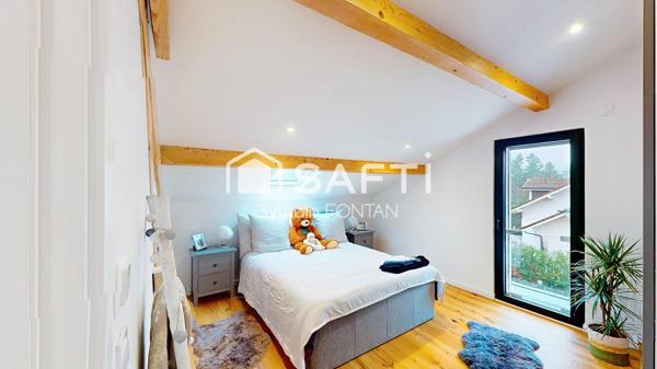 SPLENDIDE MAISON CONTEMPORAINE A DEUX PAS DE LA FRONTIERE SUISSE