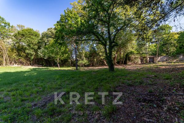 Propriété sur un terrain constructible de 3.500m² en coeur de ville