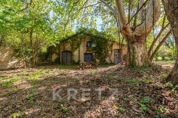 Propriété sur un terrain constructible de 3.500m² en coeur de ville