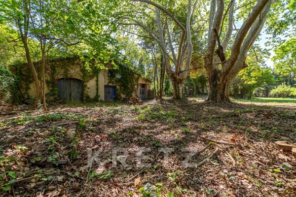 Propriété sur un terrain constructible de 3.500m² en coeur de ville