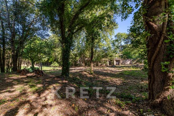 Propriété sur un terrain constructible de 3.500m² en coeur de ville