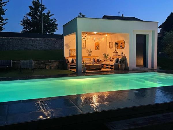 Saint-Maurice de Lignon:Villa contemporaine de 157 m2 habitables, 3 chambres sur terrain paysager de 1700 m2 avec piscine.