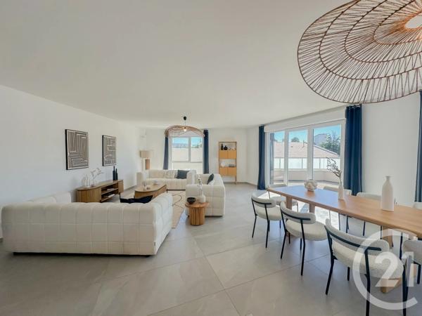 Appartement à vendre  4 pièces - 108 m 2   FRANCHEVILLE  - 69