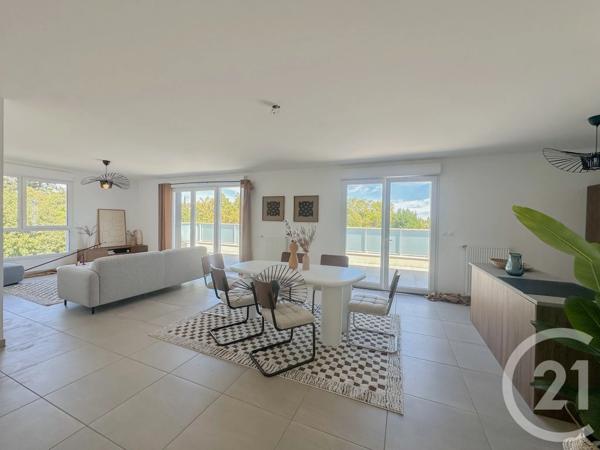 Appartement à vendre  4 pièces - 108 m 2   FRANCHEVILLE  - 69
