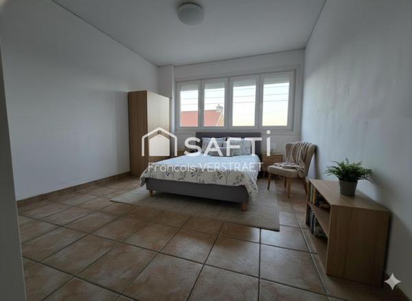 maison atypique de 125 m2 avec garage attenant , grand hangar  et jardin