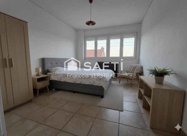 maison atypique de 125 m2 avec garage attenant , grand hangar  et jardin