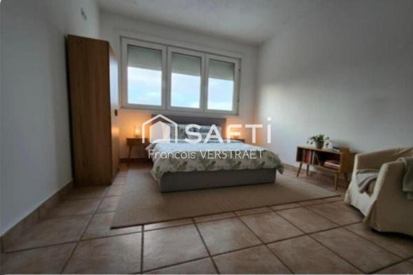 maison atypique de 125 m2 avec garage attenant , grand hangar  et jardin