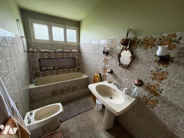 Maison avec grand terrain proche bourg de Portbail 