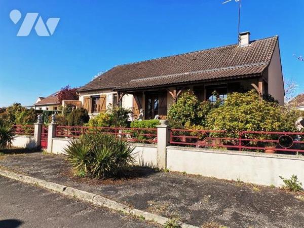 PUTANGES: Proche tous commerces, maison 4 chambres, sous sol terrain 700 m²