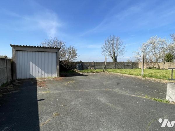 Maison d'habitation d'environ 103 m² habitables sur un terrain de 684 m².