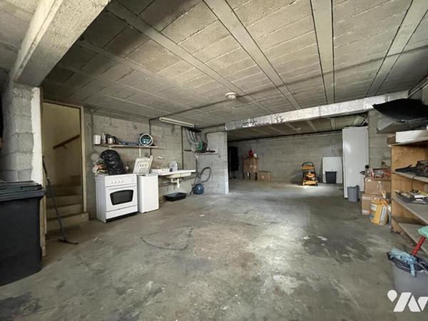 Maison d'habitation d'environ 103 m² habitables sur un terrain de 684 m².