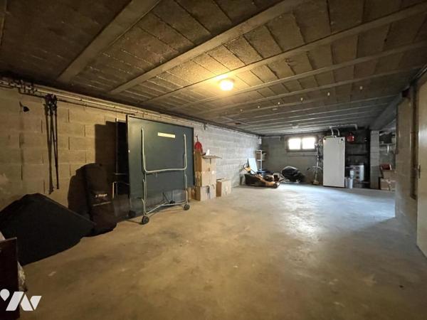 Maison d'habitation d'environ 103 m² habitables sur un terrain de 684 m².