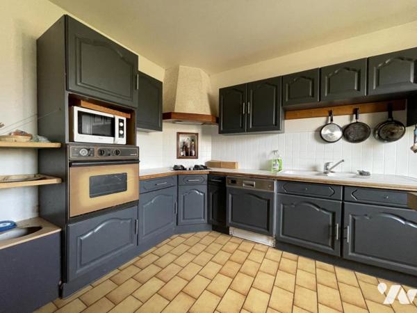 Maison d'habitation d'environ 103 m² habitables sur un terrain de 684 m².