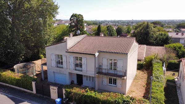 Grande maison divisible avec 5 chambres