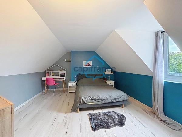 Maison familiale de 118 m² sur un terrain de 810 m² avec garage, cave et climatisation