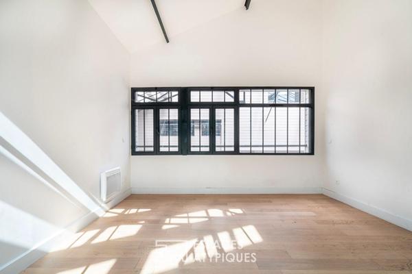 Loft en duplex avec jardin privatif en coeur de ville