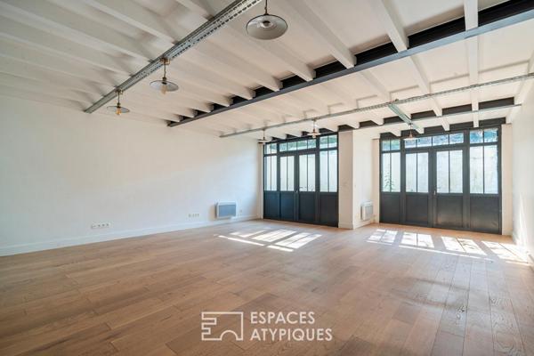Loft en duplex avec jardin privatif en coeur de ville