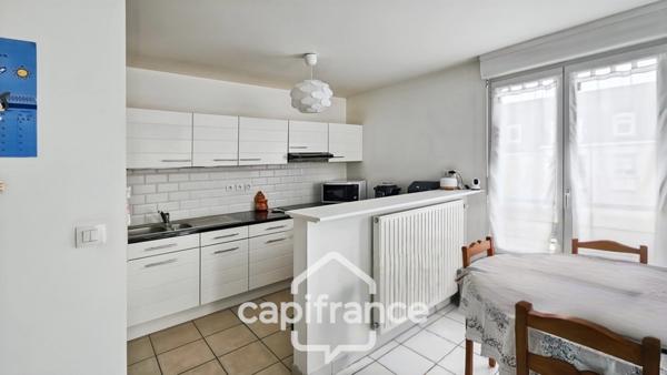 Bel appartement familial -lumineux avec balcon- 2 places de stationnement- suite parentale.