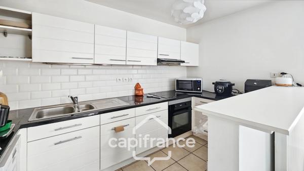 Bel appartement familial -lumineux avec balcon- 2 places de stationnement- suite parentale.
