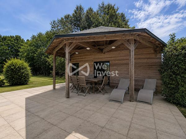 Villa familiale d'exception – 217 m², parc arboré de 5 010 m², piscine, jacuzzi et sauna, à 5 minutes du centre de Laval