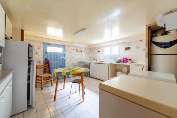 Maison bien entretenue avec joli jardin