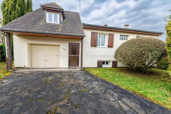 Maison bien entretenue avec joli jardin