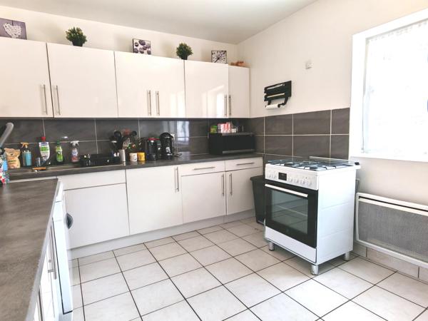 Maison avec pièce de vie spacieuse